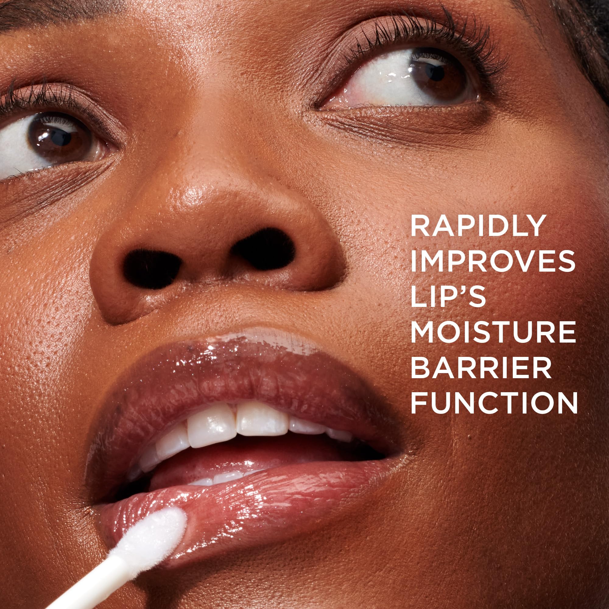 It Cosmetics Confidence in a Serum Lip Gloss glass bottle closeup emphasizes premium packaging and luxe vibes.