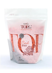 Italwax Top Line Coral hard wax pour demonstrates creamy texture for sensitive skin
