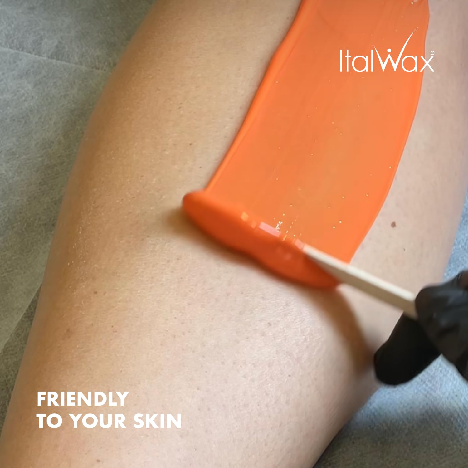 Italwax Top Line Coral hard wax skin-comfort closeup emphasizes gentle feel