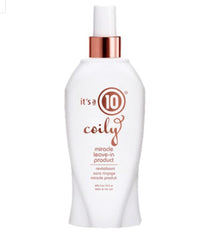 It's A 10 Haircare Coily Miracle Leave-In being applied for sleek, conditioned curls.