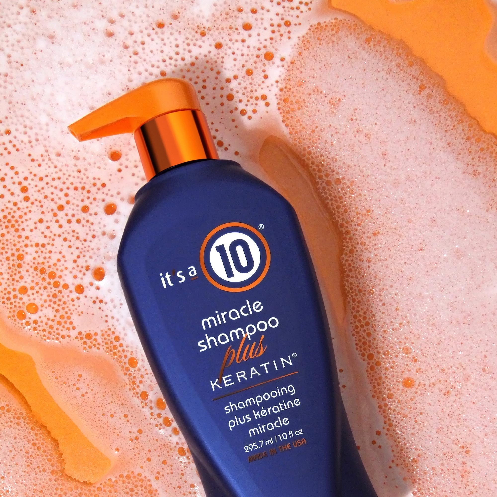 It's a 10 Miracle Shampoo Plus Keratin bottle pour reveals rich lather for cleansing