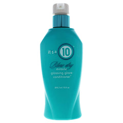 It's a 10 Haircare Miracle Blow Dry Glossing Conditioner bottle showcases shine-boosting, smooth-hair benefits.