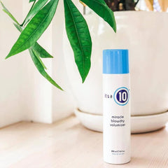 Its A 10 Miracle Blowdry Volumizer 6 Oz bottle demonstrates easy-to-use styling for quick mornings.