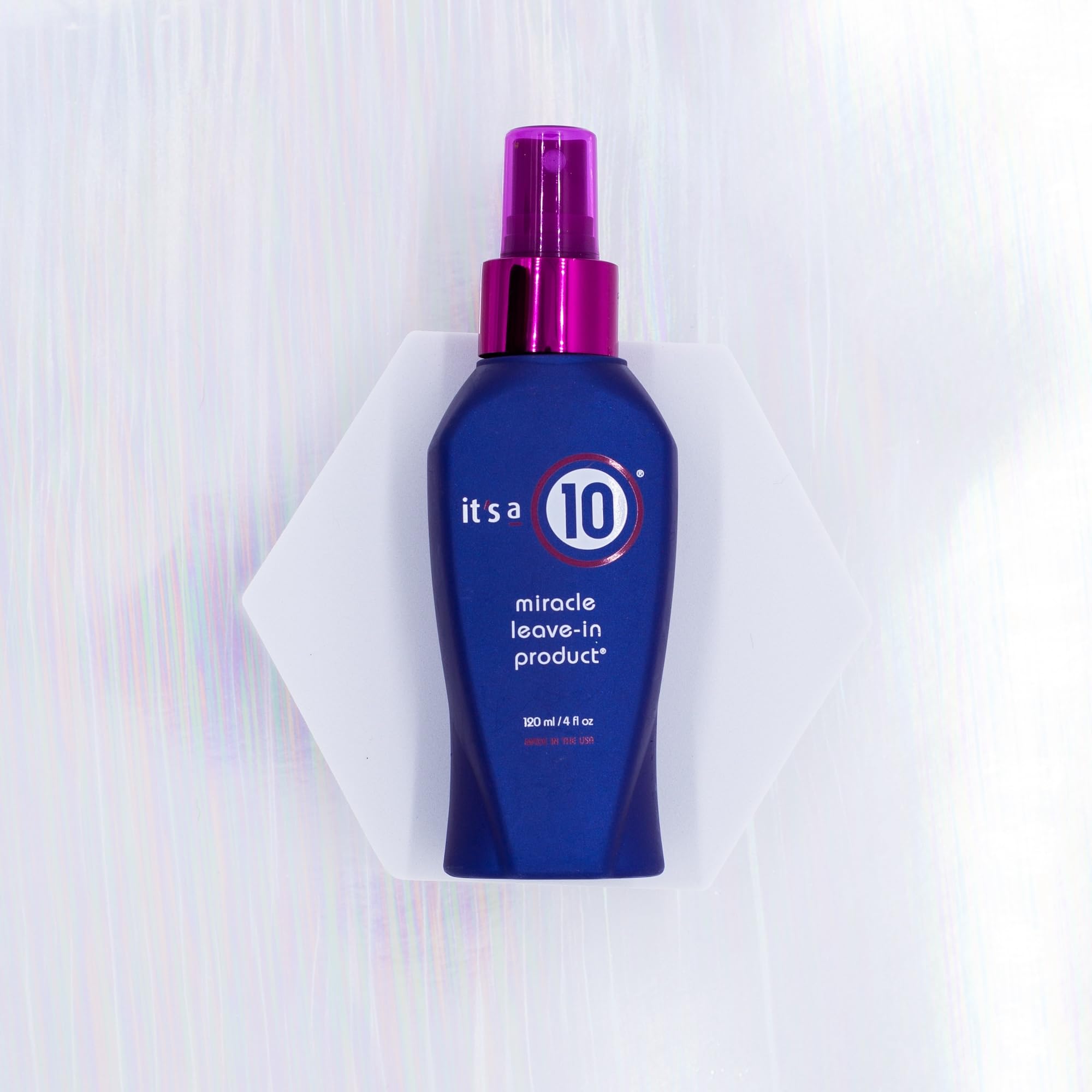 It's a 10 Miracle Leave-In pump demonstrates even application for frizz control