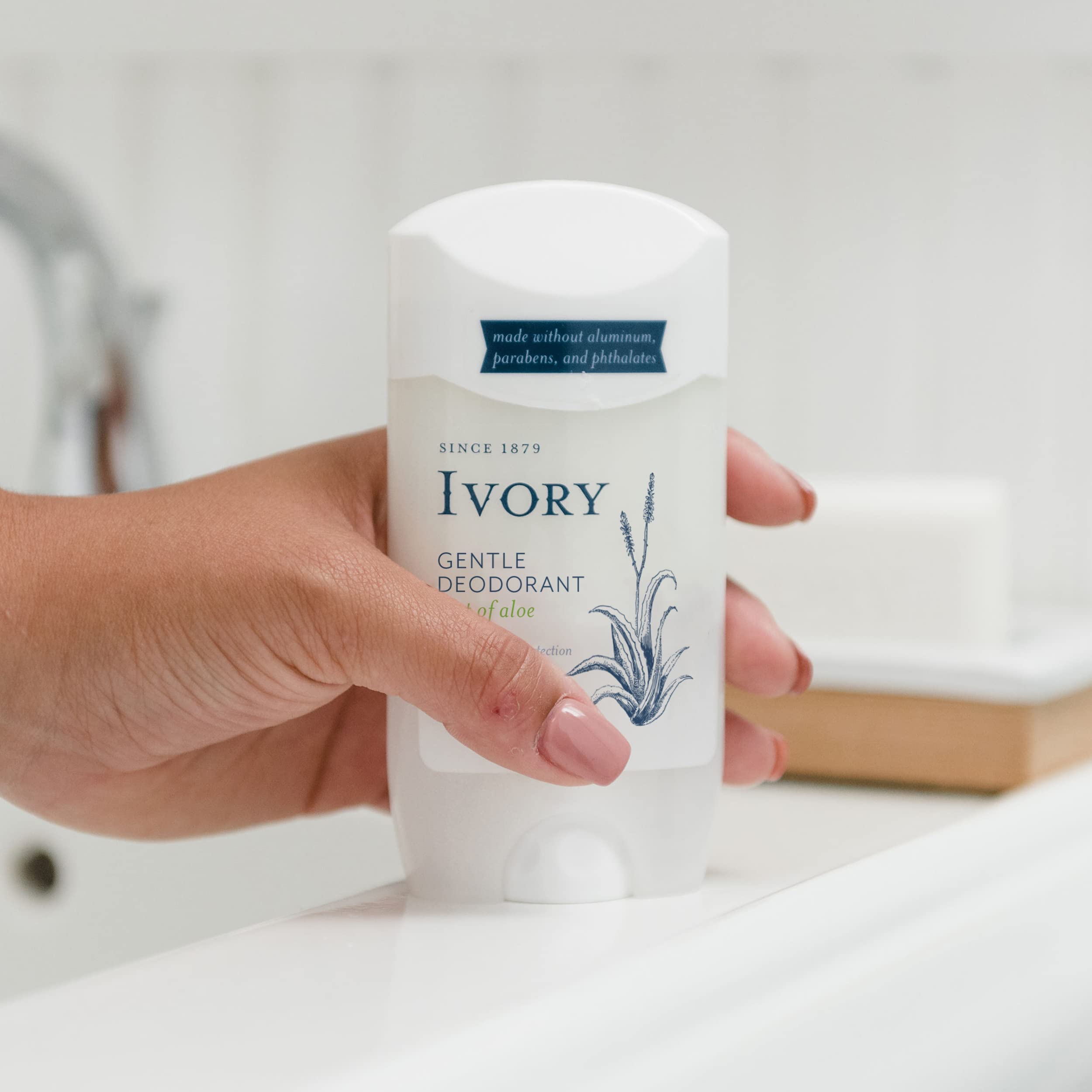 Ivory deodorant hint of aloe back packaging highlighting aluminum-free formula.