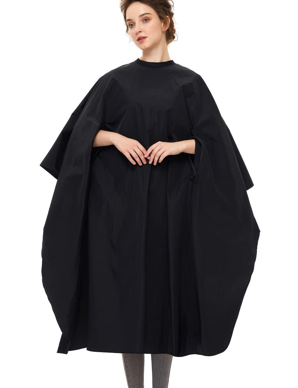 Izzycka barber cape with armholes showing hands-free design for precise grooming.