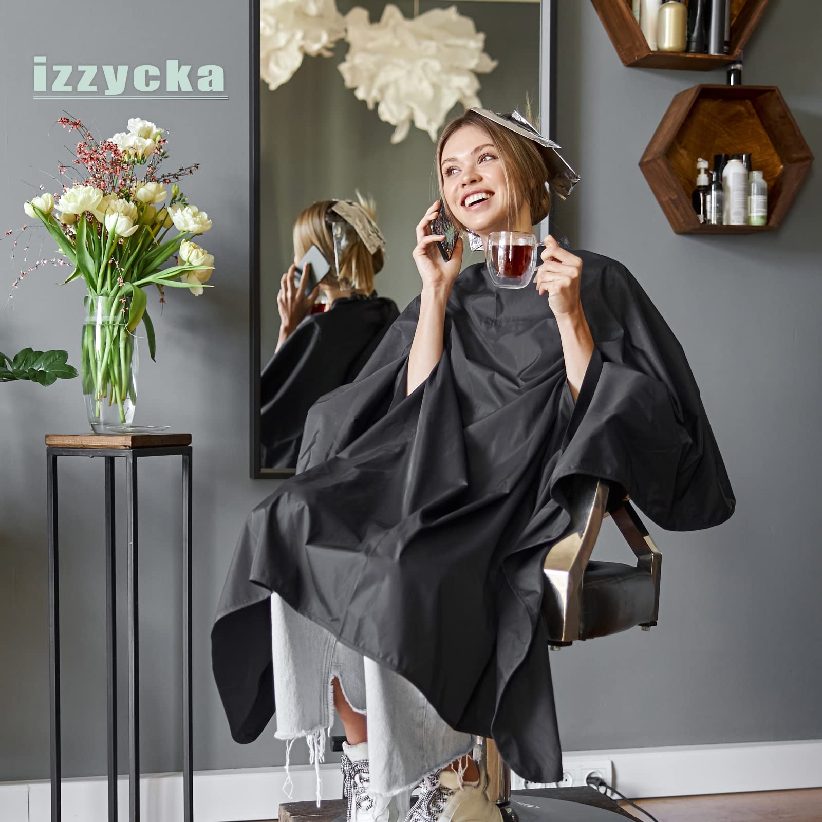 Izzycka barber cape easy-clean and reusable via wipe or machine wash.