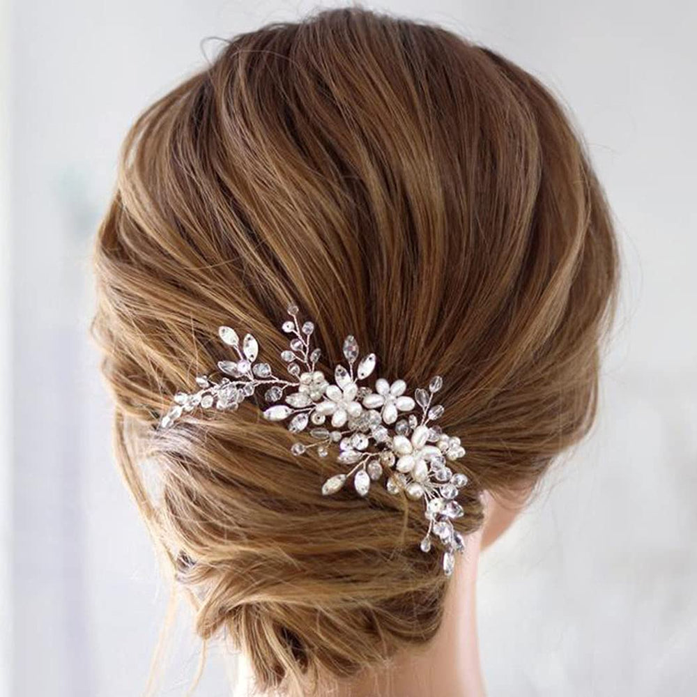 Jakawin hair accessory bridal comb close-up highlights pearls, crystals, and delicate metalwork.