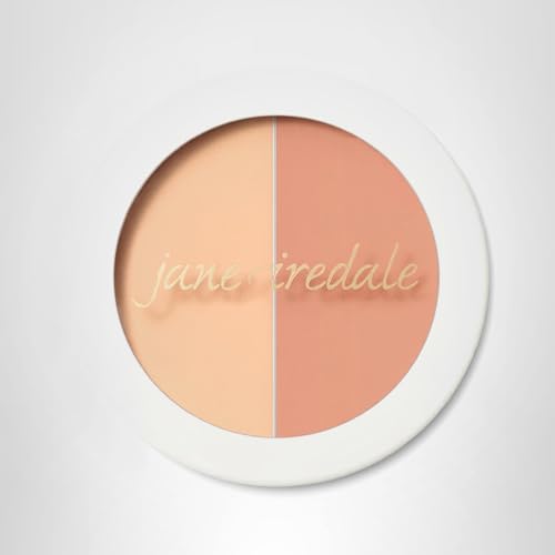 Jane Iredale Circle Delete concealer applied with brush for seamless finish.