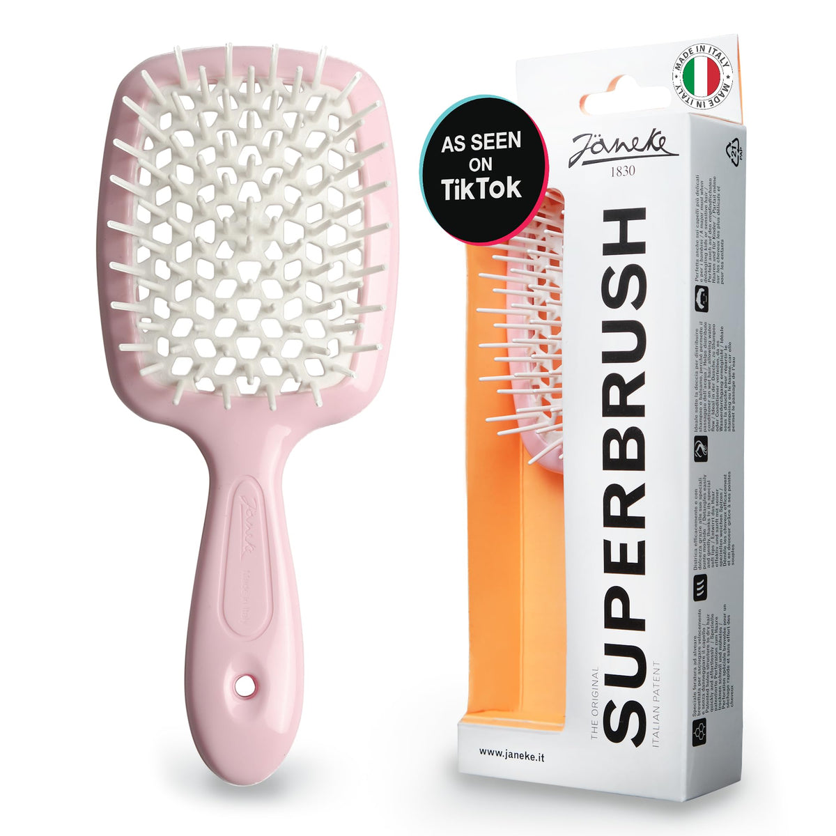 Janeke Superbrush pink close-up highlighting vented honeycomb design for fast drying.