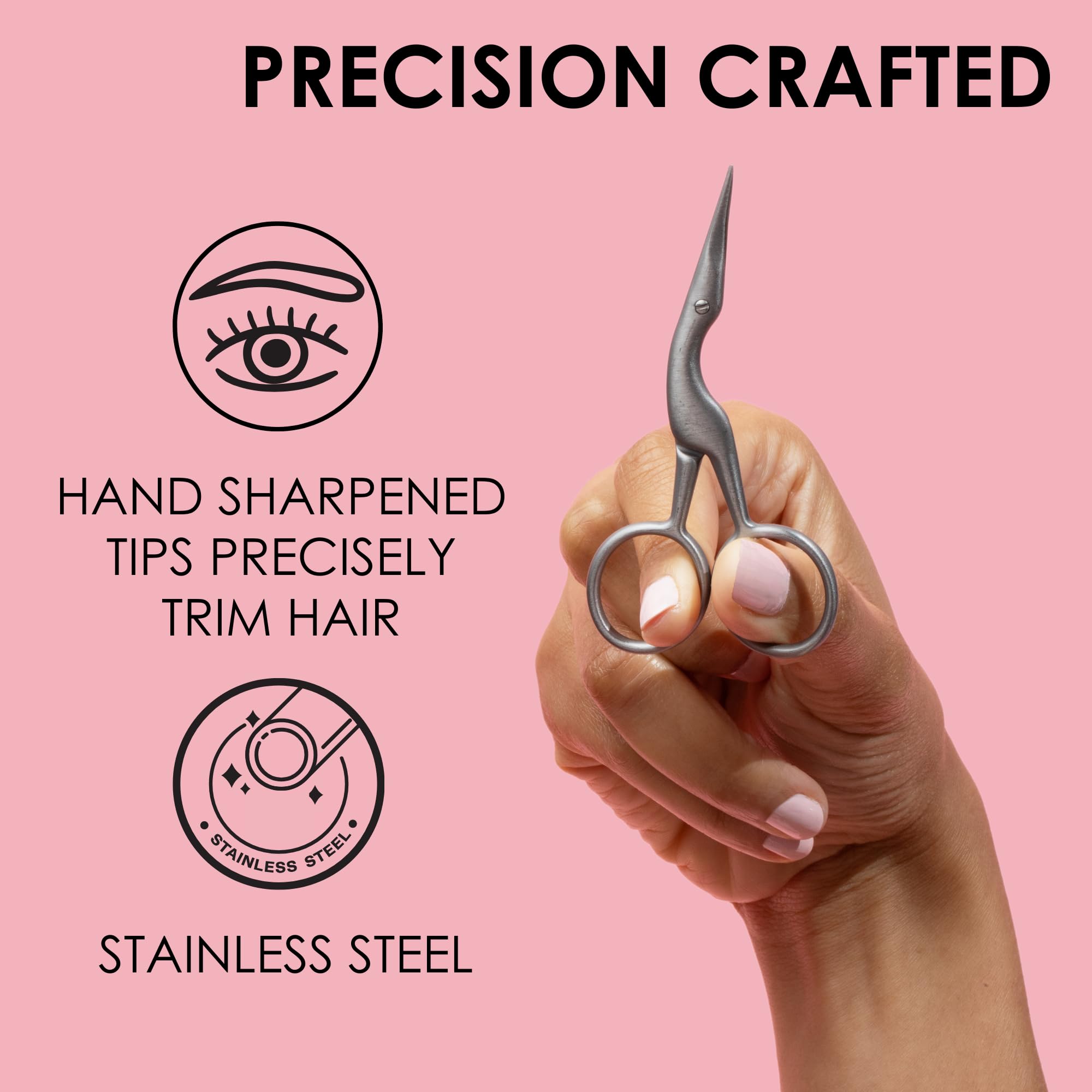 JAPONESQUE brow spoolie close-up bristles hold brows while trimming for precision
