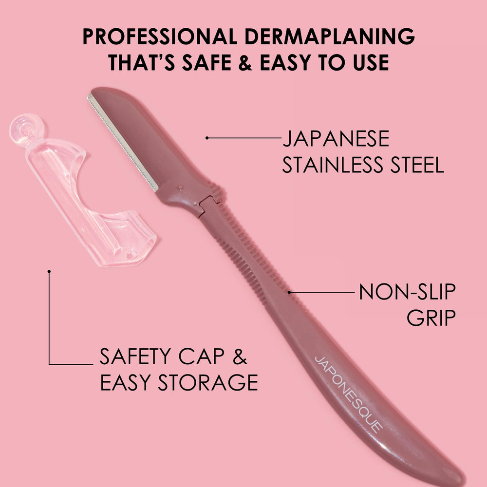 JAPONESQUE Dermaplaner stainless steel blade close-up highlighting ultra-sharp precision.
