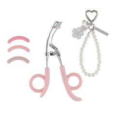 JAPONESQUE Heart Defensor Pro Curler with keychain and cherry blossom charm for on-the-go styling.
