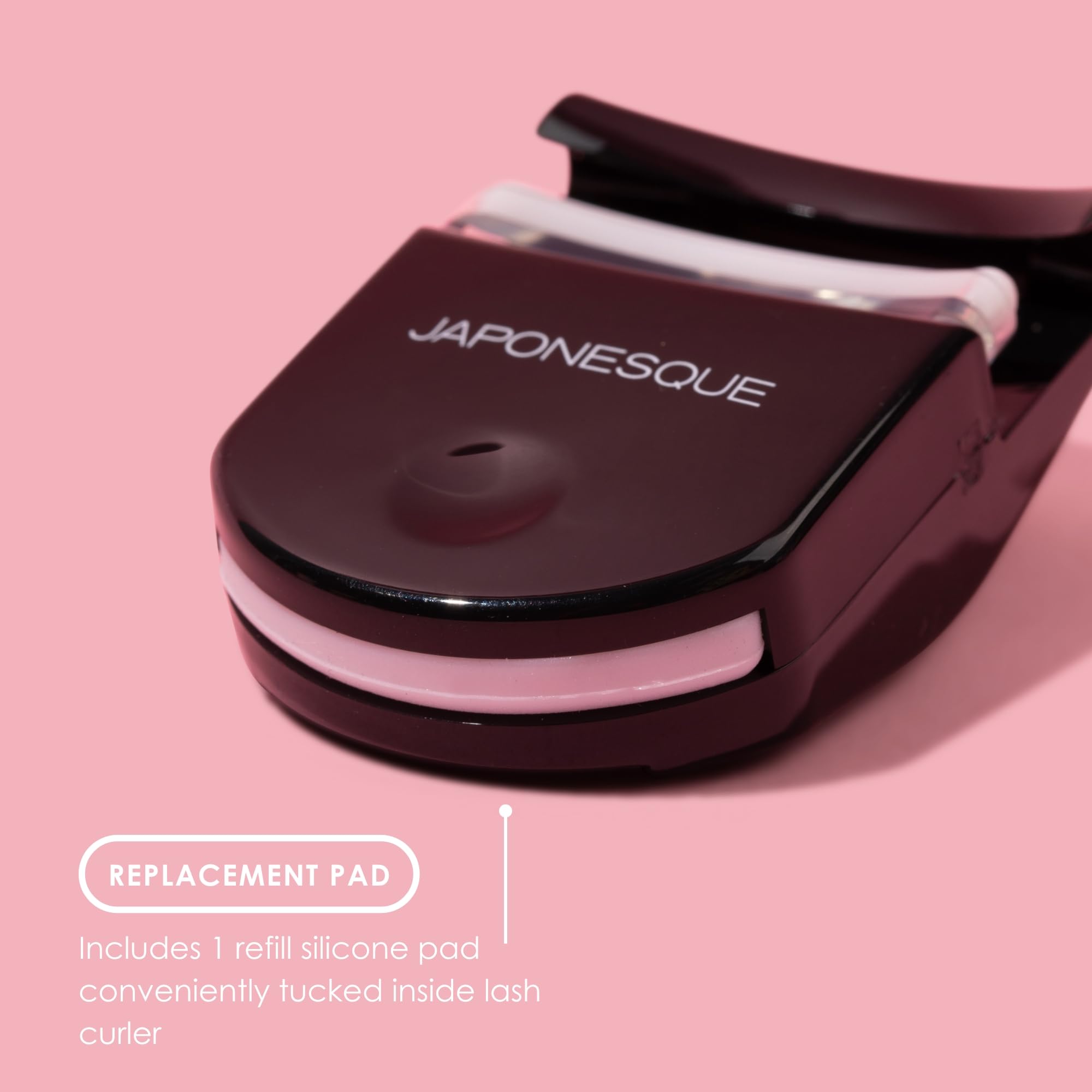JAPONESQUE Travel Eyelash Curler Black 2 Pack cap tucked extra pad for convenience.