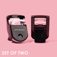 JAPONESQUE Travel Eyelash Curler Black 2 Pack top view shows natural arch ideal for almond eyes.