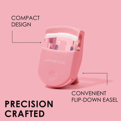 JAPONESQUE travel eyelash curler pink with bonus pad inside emphasizes easy replacement