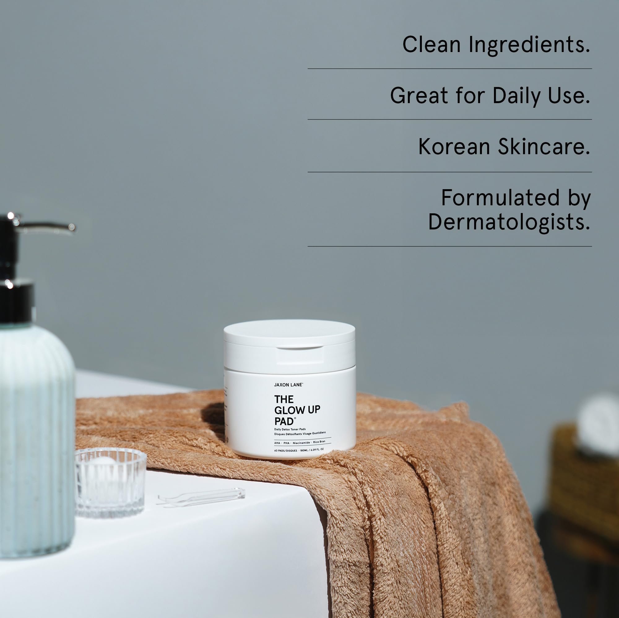 Dermatologist-inspired Korean skincare routine with JAXON LANE pads for daily care.
