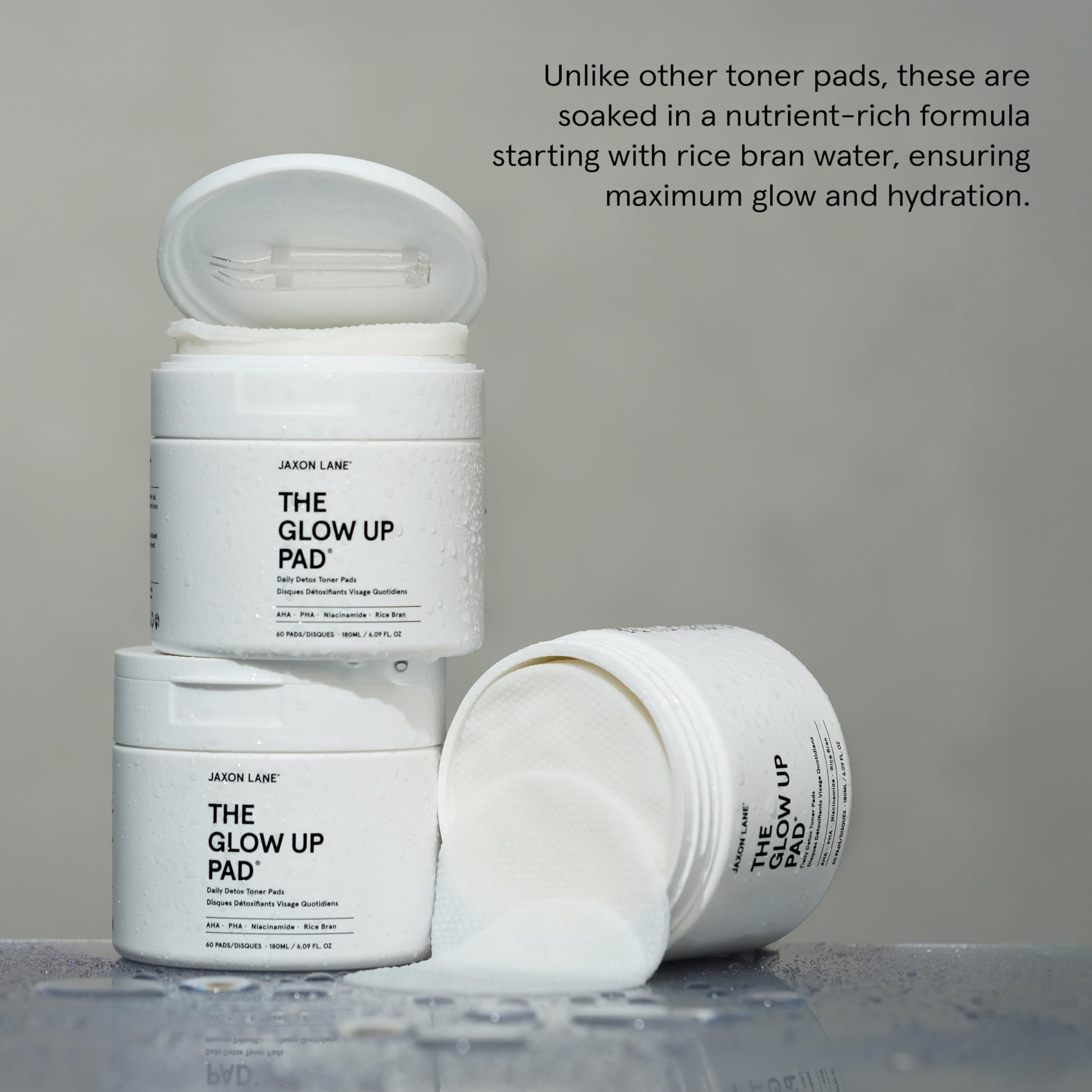 Portable JAXON LANE toner pads for post-workout skin refresh on the go.