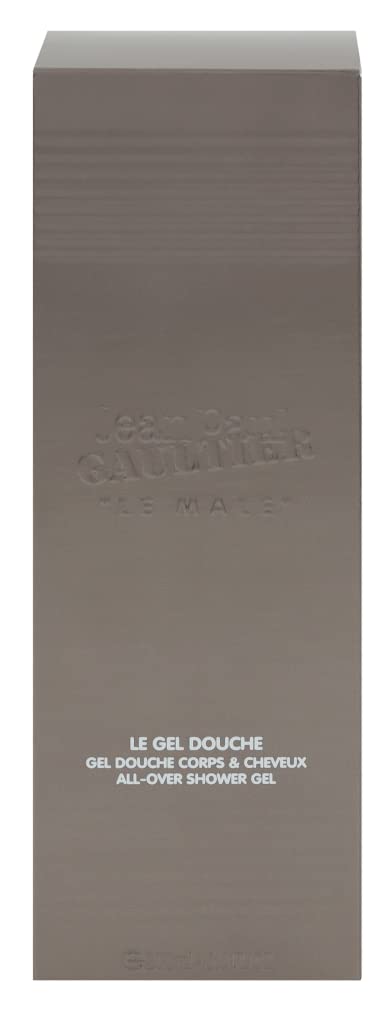 Jean Paul Gaultier Le Male shower gel packaging on shelf evokes premium grooming ritual.