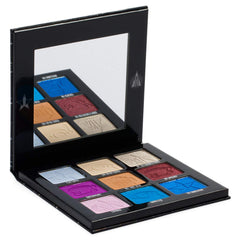 Jeffree Star Mini Controversy palette swatches reveal bold blues and purples for versatile looks.