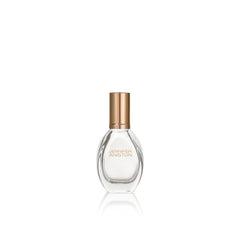 Jennifer Aniston Solstice Bloom bottle closeup signaling radiant daytime wear confidence.