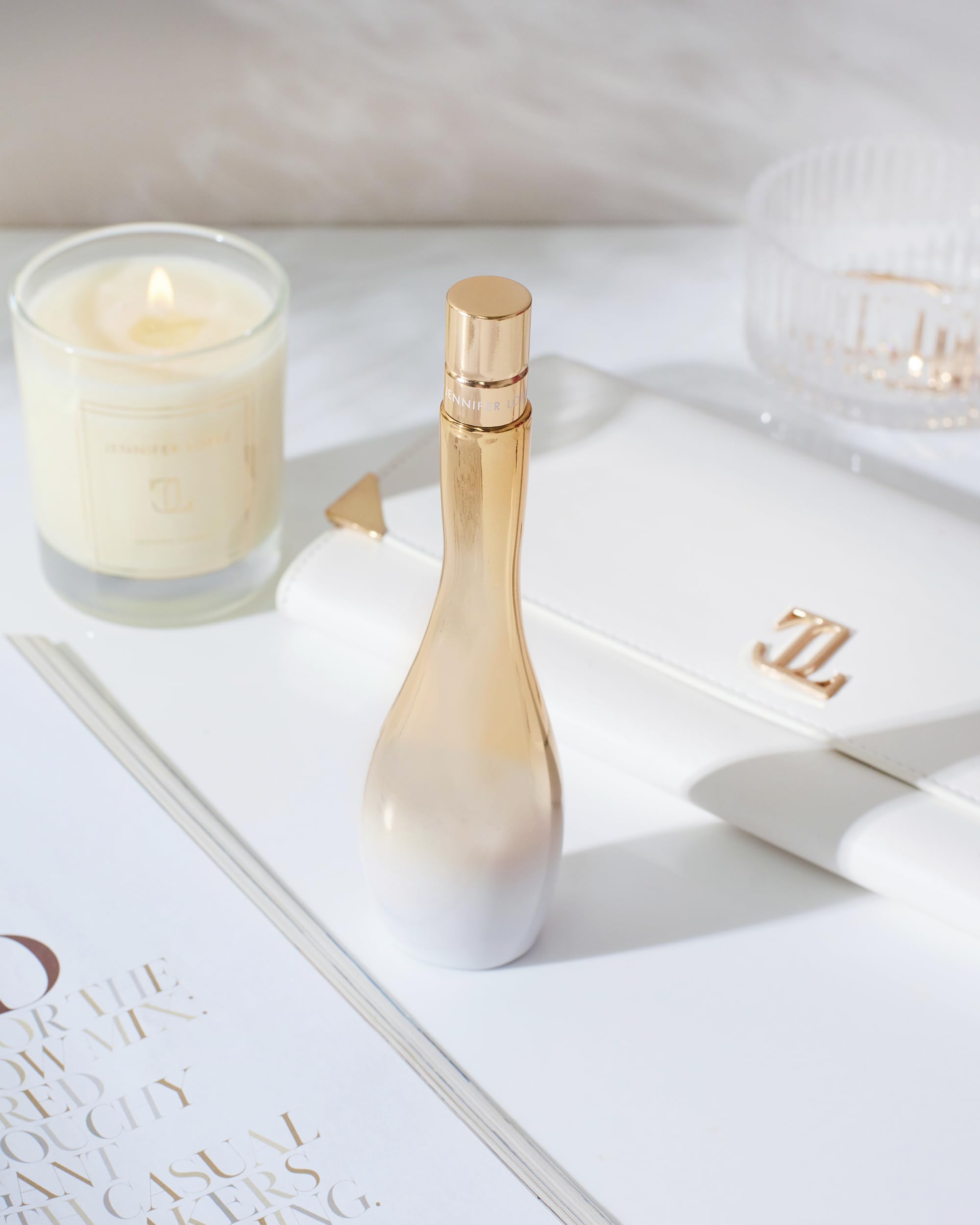 Jennifer Lopez Enduring Glow cap closeup highlights elegant packaging.