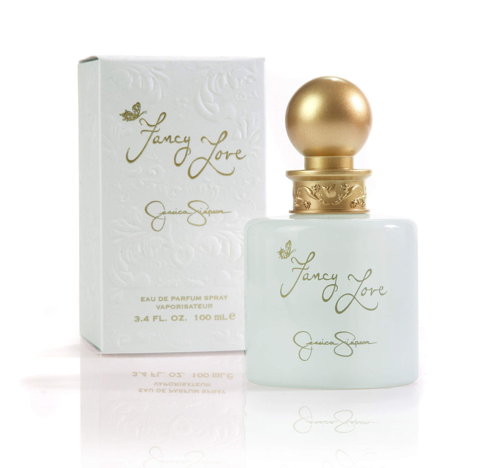 Jessica Simpson Fancy Love bottle with blush glass, ideal for romantic date-night fragrance.