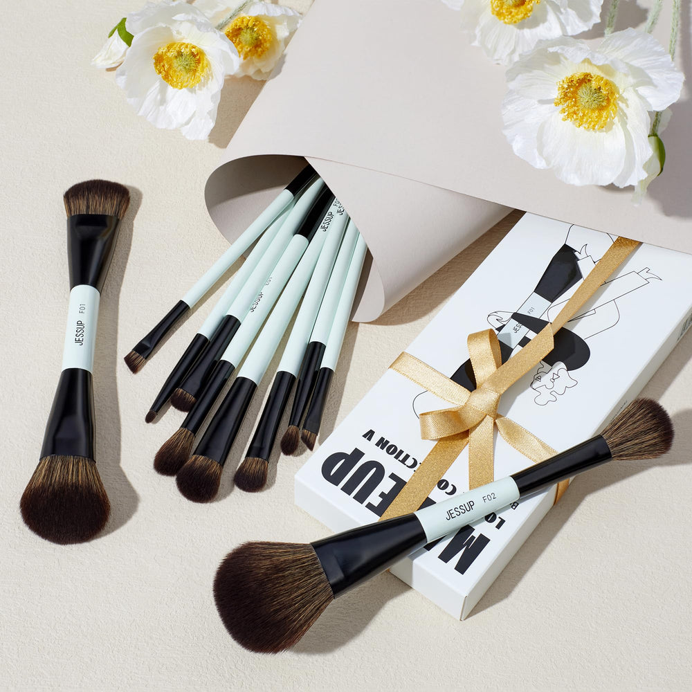Jessup concealer brush applying precise coverage on uneven skin.