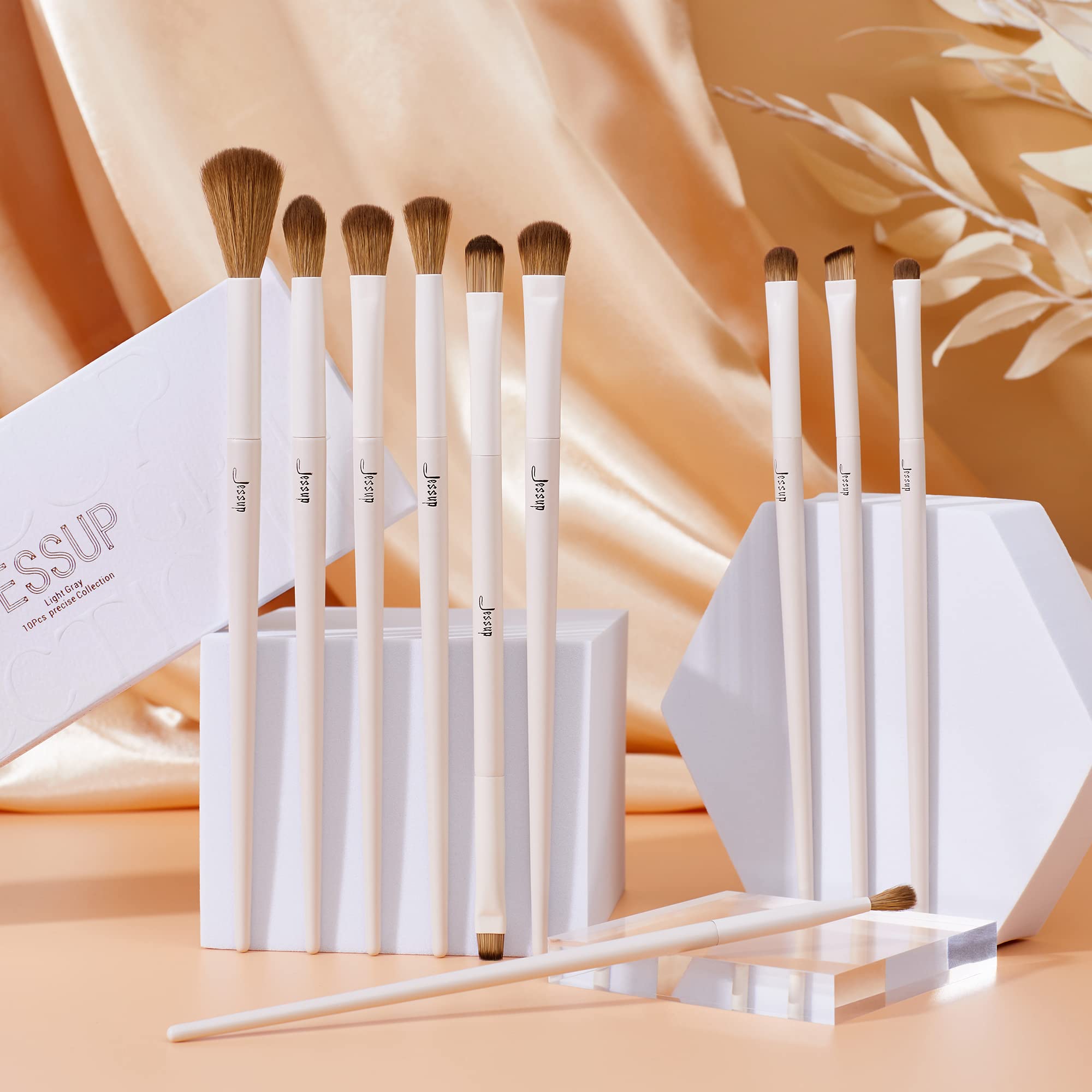 Jessup highlighting brush adds lift with soft, radiant finish.