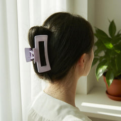 JGQUR lilac satin scrunchies worn on wrist for all-day comfort.