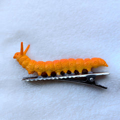 JINBUYAO caterpillar hair clip pink brightens festive hairstyles.