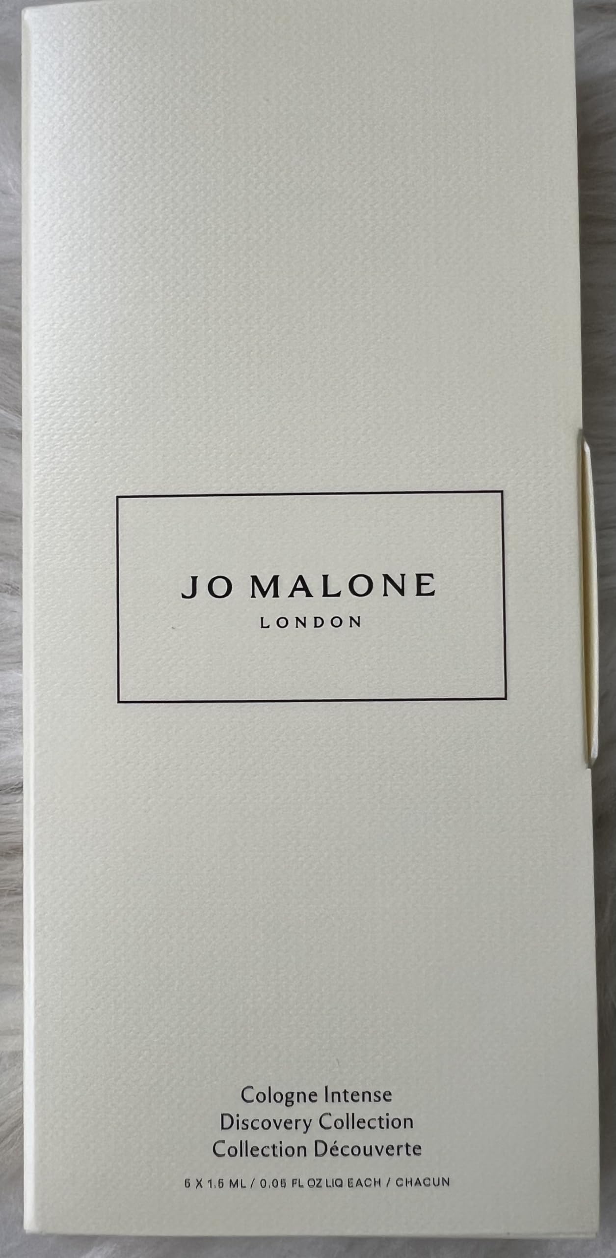 Jo Malone Oud & Bergamot mini bottle for versatile day-to-night use.