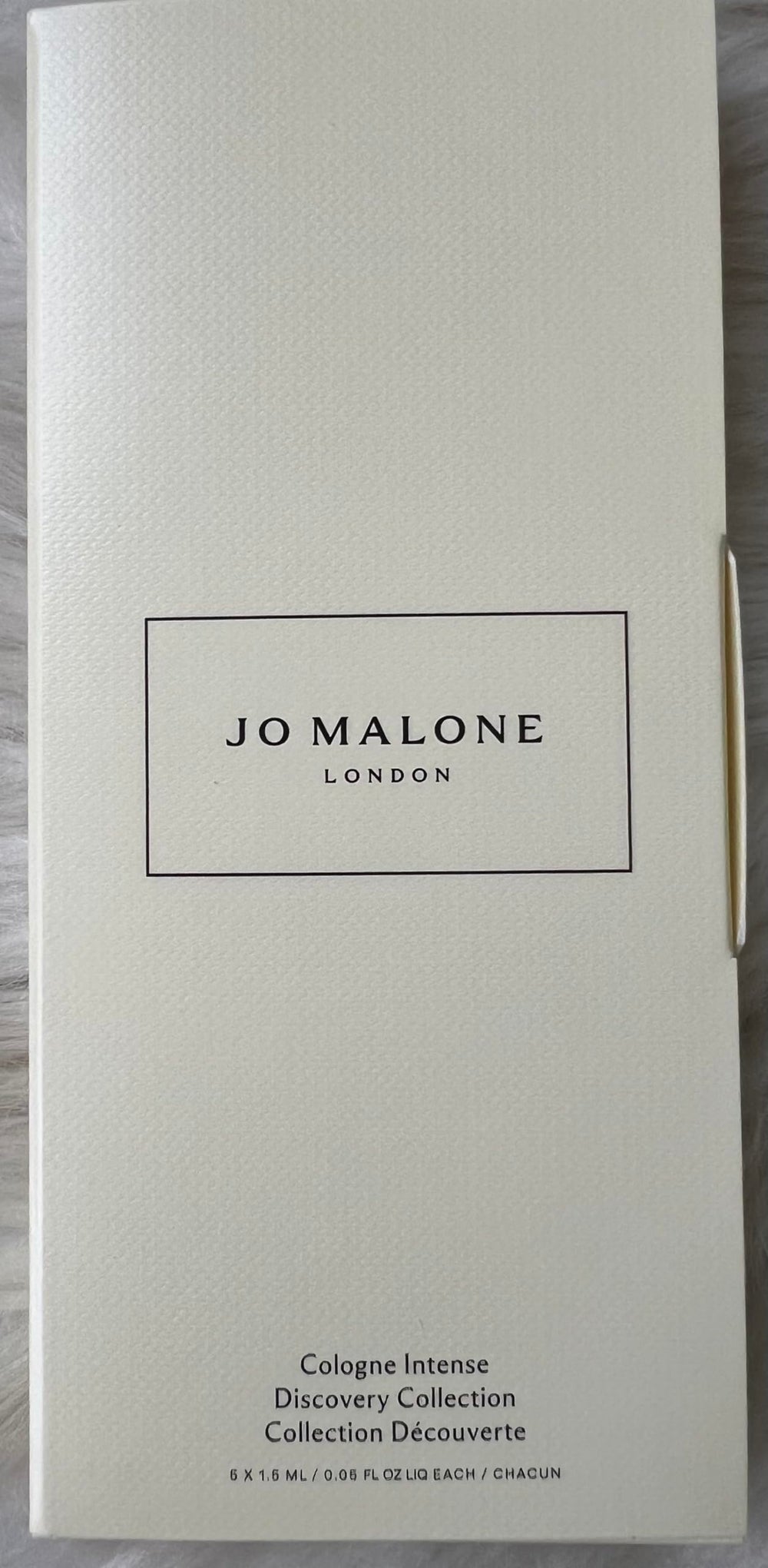 Jo Malone Oud & Bergamot mini bottle for versatile day-to-night use.