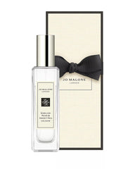 Jo Malone English Pear & Seet Pea Cologne spray highlights soft floral notes for daytime wear.