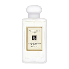 Jo Malone Nectarine Blossom & Honey bottle displays a bright, fresh fragrance for everyday wear.
