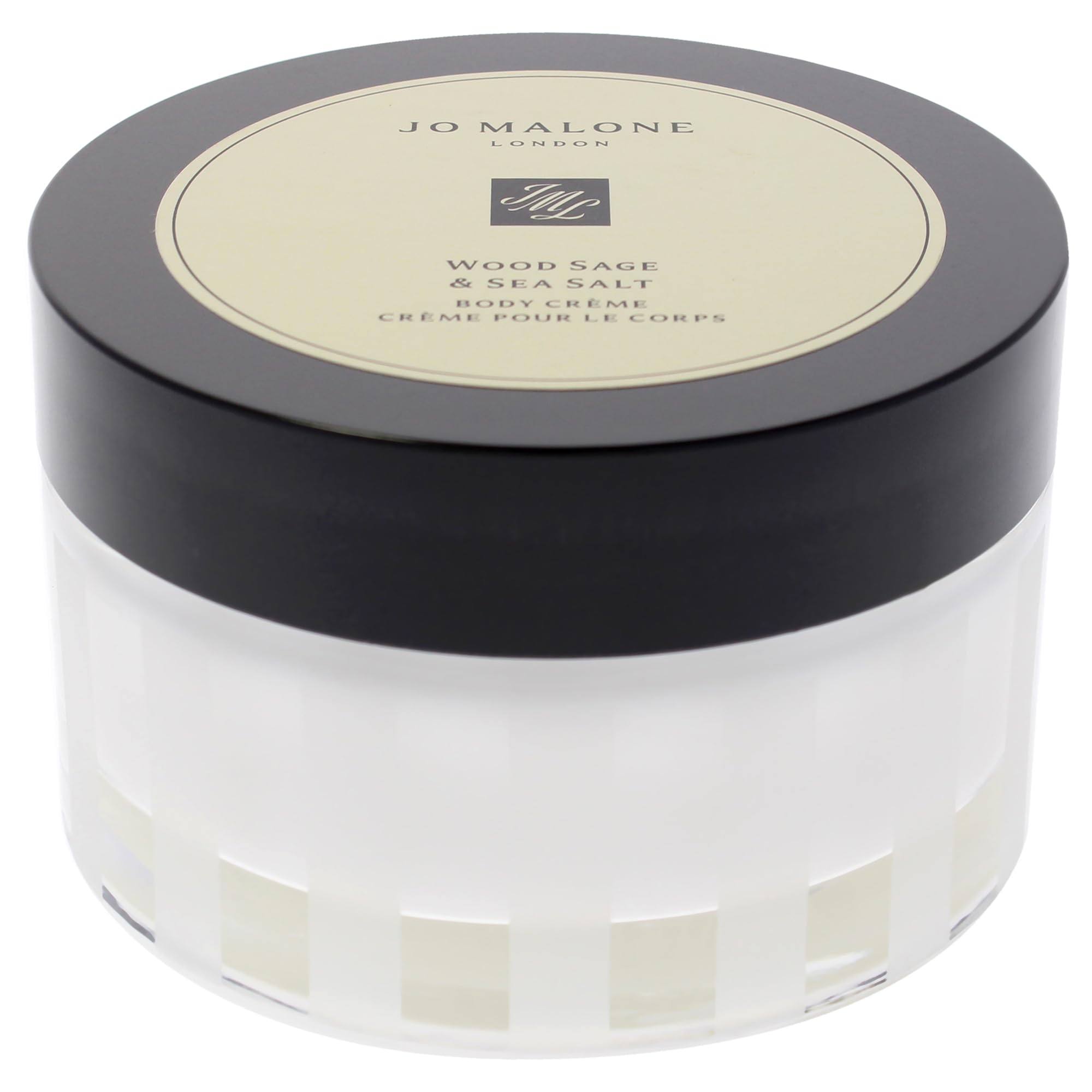 Jo Malone Wood Sage & Sea Salt Body Crème cream swirl on skin for hydration.