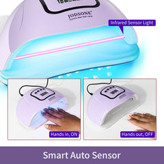 JODSONE lamp in use with hand inserted for hands-free auto-sensor activation.