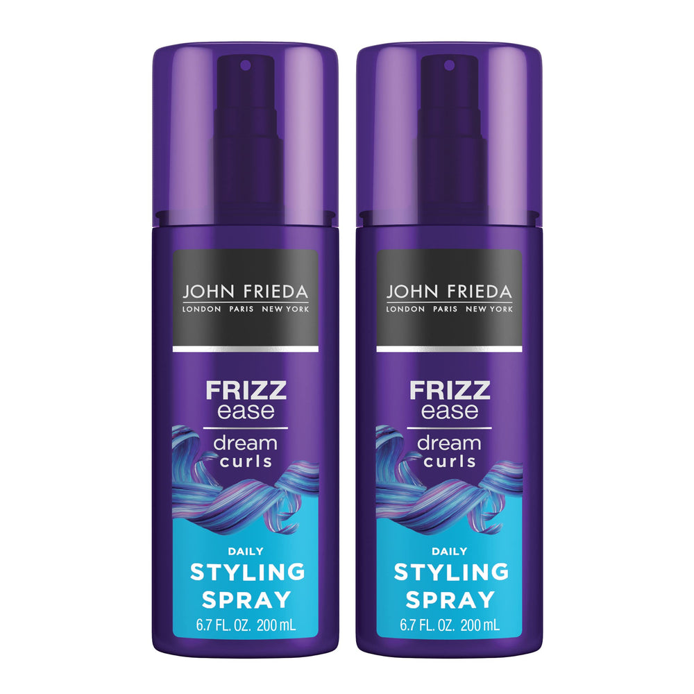 John Frieda Dream Curls daily styling spray bottle closeup showing frizz control for defined curls