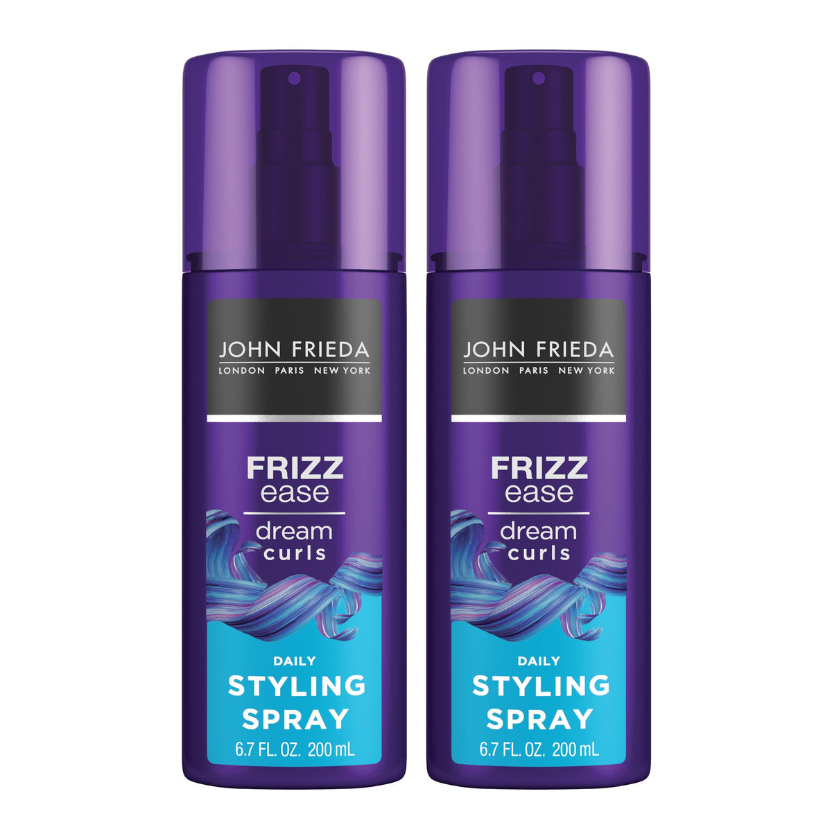 John Frieda Dream Curls daily styling spray bottle closeup showing frizz control for defined curls