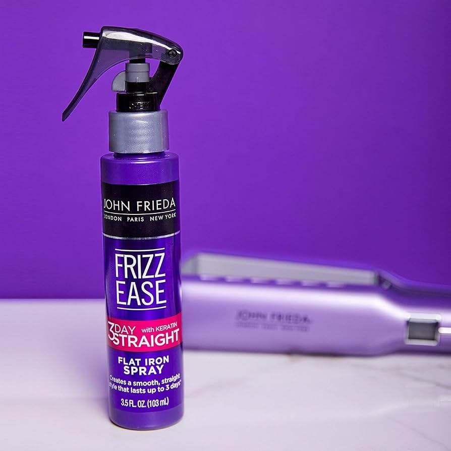 John Frieda Frizz-Ease 3 Day Straight spray closeup showing frizz control and color-safe styling.