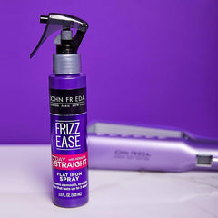 John Frieda Frizz-Ease 3 Day Straight spray closeup showing frizz control and color-safe styling.