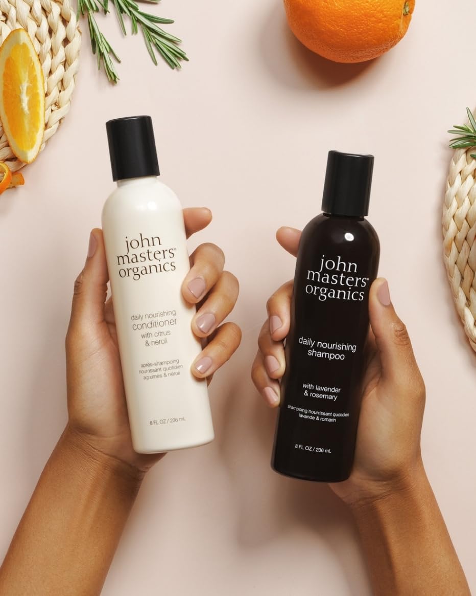 John Masters Organics Rosemary Oil close-up highlights purifying scalp care.
