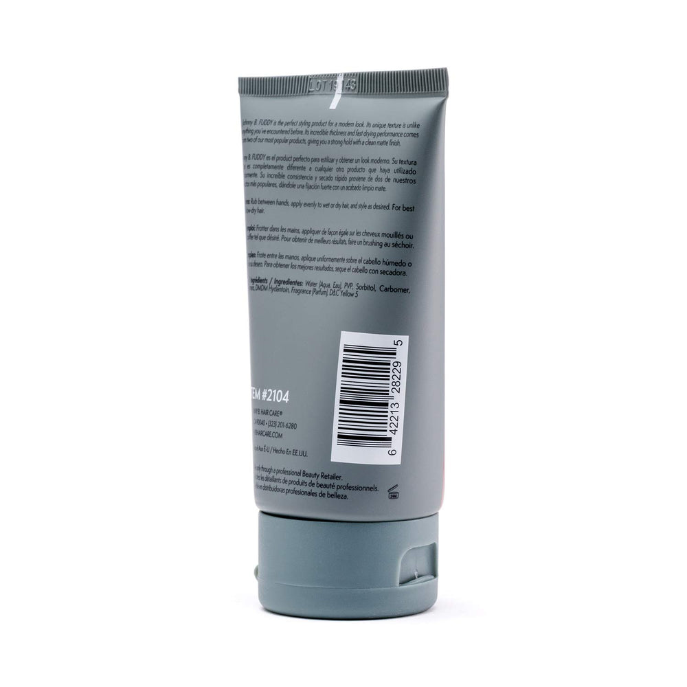 JOHNNY B. Fuddy texture closeup reveals thick formula for strong hold