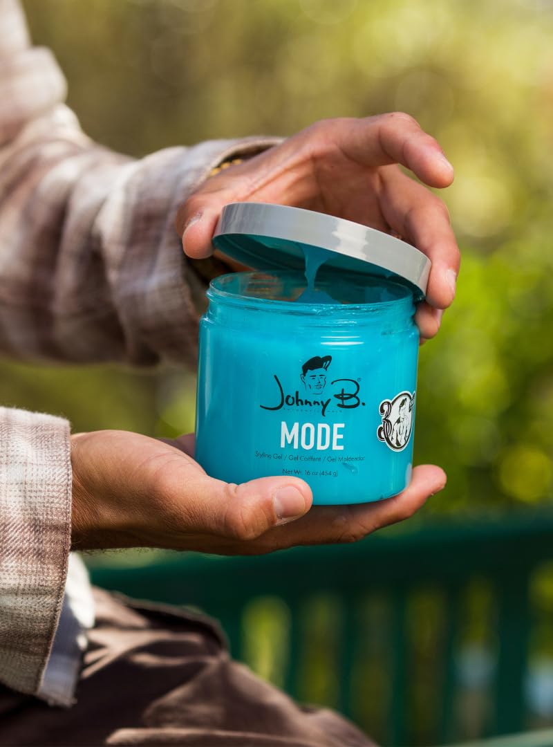JOHNNY B. Mode no-flake finish on hair demonstrates clean style.
