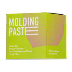 Johnny B. Molding Paste tube-dispense demonstrates easy application for quick styling.