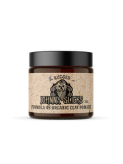 Johnny Slicks Formula 49 pomade jar highlights firm hold and matte finish.