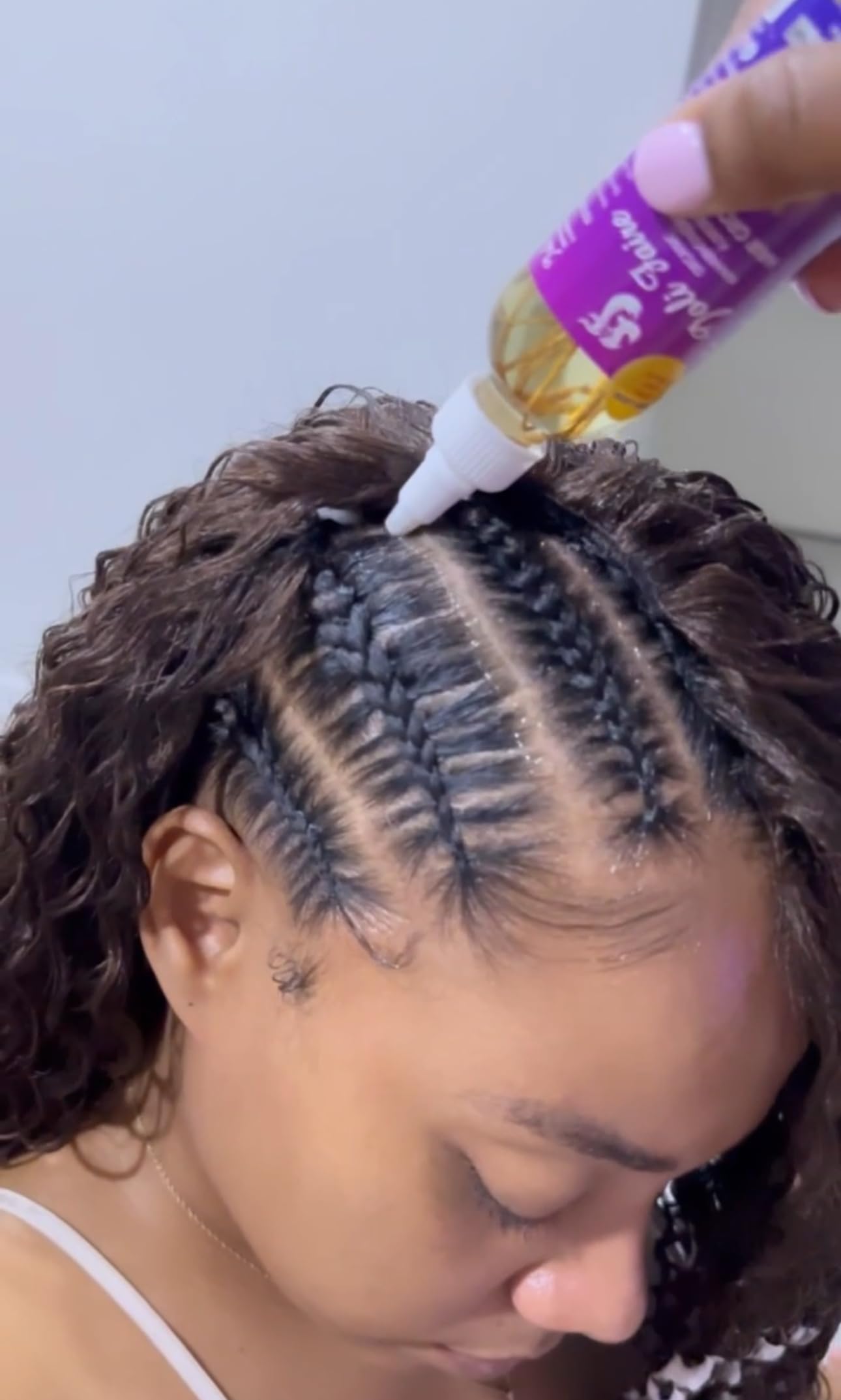 Joli Faire Hair Growth Oil nourishes scalp for hydration and vitality.