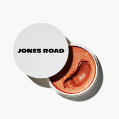 Jones Road Miracle Balm Golden Hour tube for warm peach glow with gold shimmer