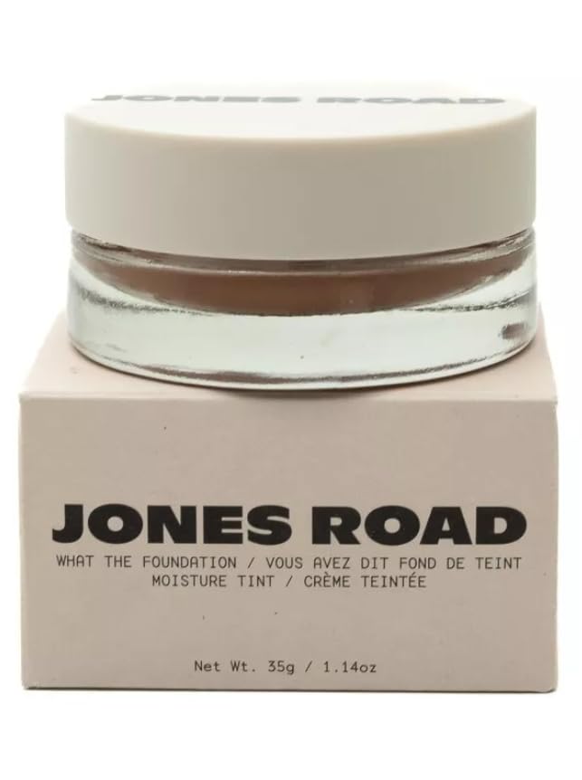 Jones Road What The Foundation bottle pour demonstrates easy, buildable coverage for a natural complexion.