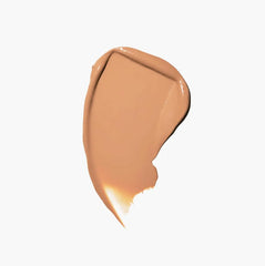 Jones Road What The Foundation face application beige reveals seamless blending with skin for fresh look.